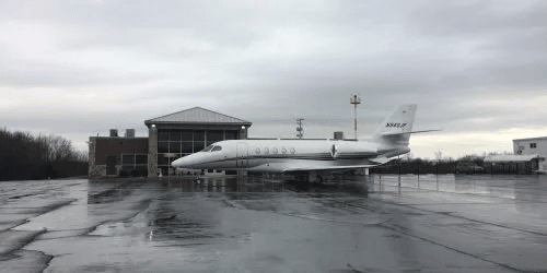 Small White Jet on Wet Concrete